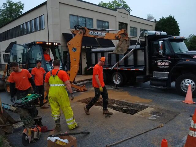 The crew at work sewer trap replacement 04 1
